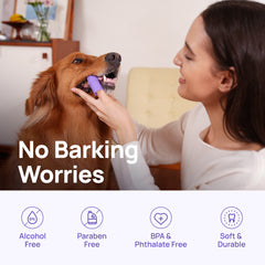 Woman brushing a golden retriever's teeth with HICC PET silicone finger toothbrush - alcohol free, paraben free, BPA and phthalate free, soft and durable