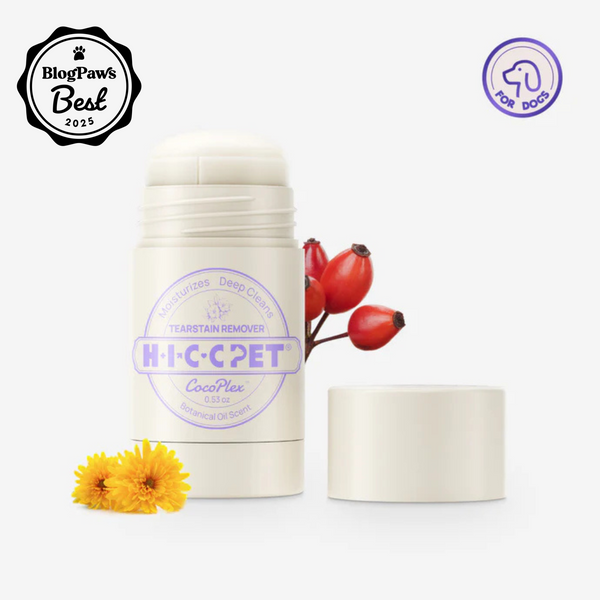hicc pet Tear Stain Remover Butter with the cap off and flowers next to it. There is a blogpaws award icon on the image.